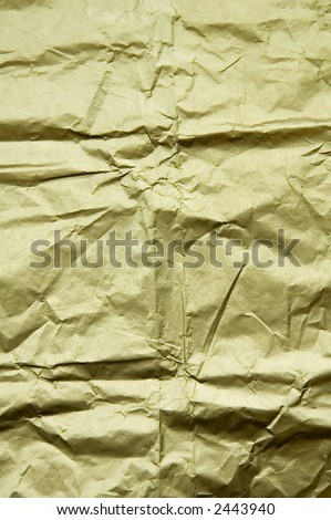 Creased wrapping paper with hidden face