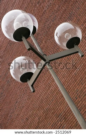 Light globes on post outside university center for performing arts
