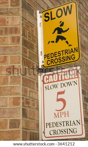 Two signs are better than one: warning signs for motorists to slow down at pedestrian crossing