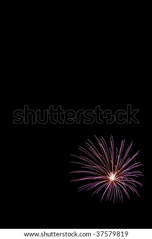 Purple burst of fireworks near corner of frame, with copy space