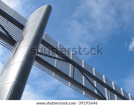 Futuristic pylon and transverse element at building entrance on campus of community college