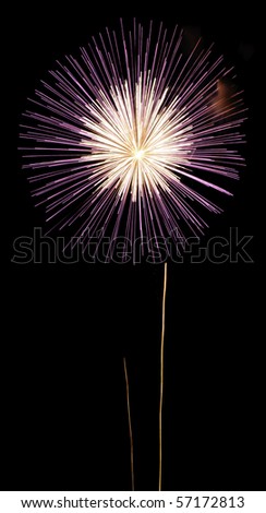 Flowerlike fireworks bloom, white in the center, reddish-purple on the outside, with two thin rocket trails