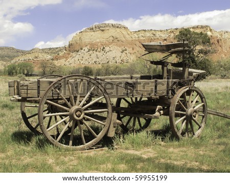 Basic transportation in the Old West: wooden wagon on grassy valley floor in New Mexico