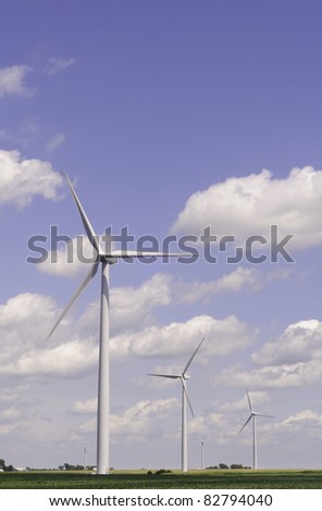 Wind turbines tower above farmland in northern Illinois