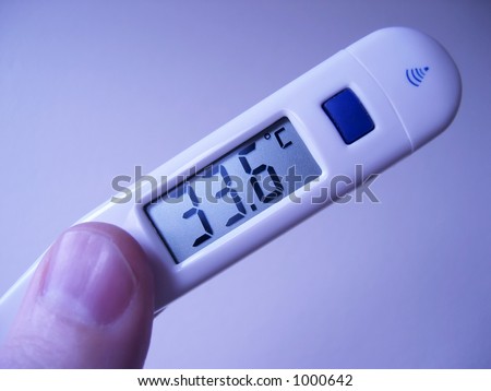 Medical close up of digital thermometer with centigrade readout with a cool blue tint