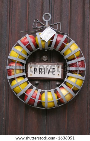Ornamental Apple Garland on door with private sign