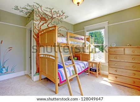 Baby girl bedroom with double bulk bed.