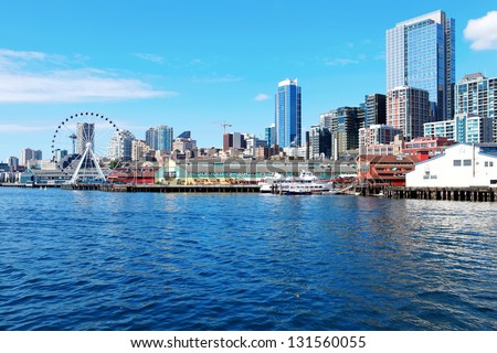 Seattle waterfront Pier 55 and 54. Downtown view from ferry.