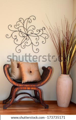 Great Decorated Corner With Vase And Dry Branches, Wood Rustic Chair, Pillows And Handmade Abstract Wall Art