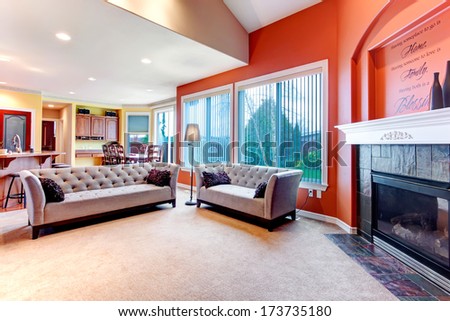 Great Color Combination. Orange Walls Make Your Living Room Stand Out