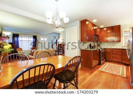 Well Matched Blue Living Room With Brown Tones Kitchen Room And Dining Area