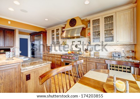 Yellow Tones Kitchen With Tile Decorated Backsplash, Kitchen Appliances And Dining Table Set