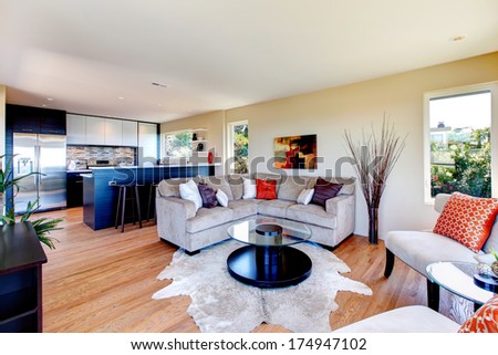 Bright Furnished Living Room With Mocha Furniture And Rug Great Match With Black Wood Kitchen Room