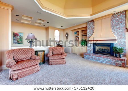 Cathedral Ceiling Bright Luxury Family Room With Antique Arm Charis