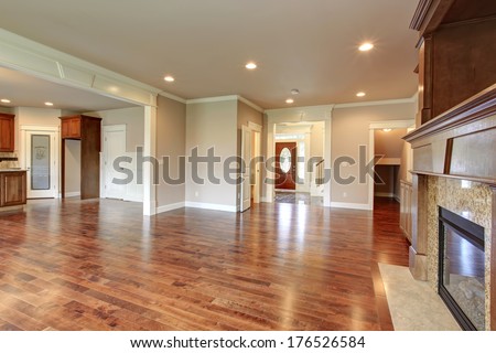 Empty Big Living Room With Fireplace Open Top Kitchen Room And Entrance Hallway