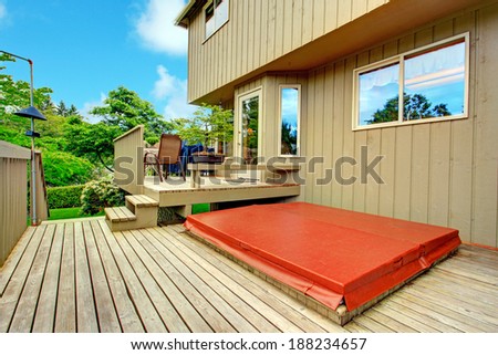 Spacious two level backyard deck. Patio area on the first level and jacuzzi is on the second one