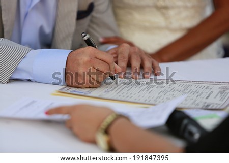 An important part of wedding ceremony is signing a marriage license