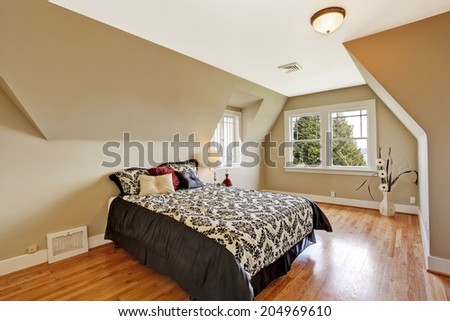 Elegant bedroom interior  in light ivory tone Furnished with bed in brown and white bedding with pillows