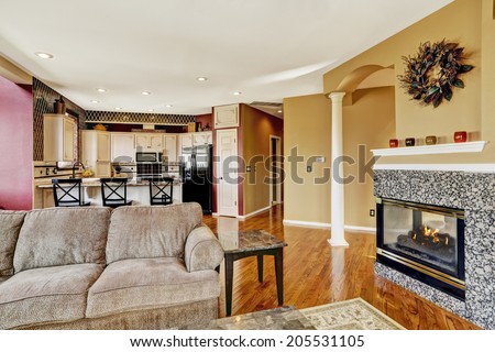 House interior. View of entrance hall with small office area with attached desk to wall