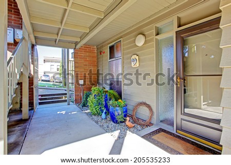 Residential building. View of entrance porch and walkway