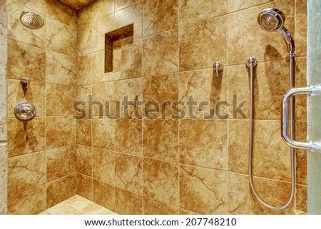 Granite tile wall trim in luxury bathroom