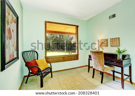 Simple room corner with desk and two chairs