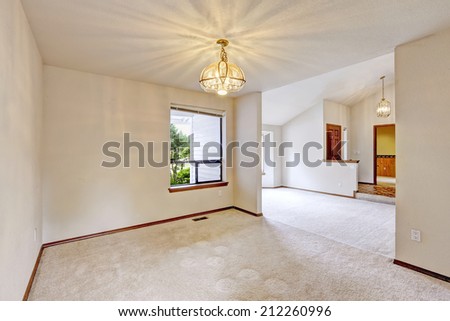 Empty house interior. Small bright room and entrance hallway