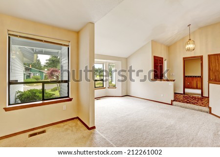 Empty house interior. Small bright room and entrance hallway