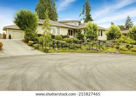 Ideas for front yard landscape design. Garden with trees and rocks. Real estate in Federal Way, WA
