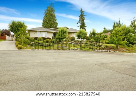 Ideas for front yard landscape design. Garden with trees and rocks. Real estate in Federal Way, WA
