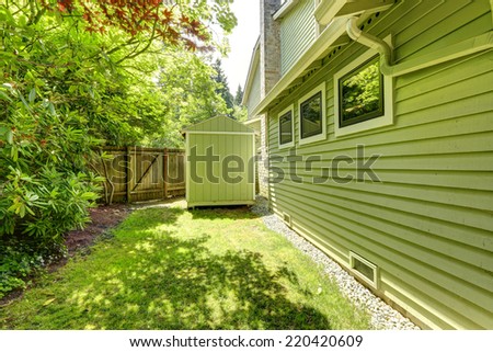 House with small shed on backyard area