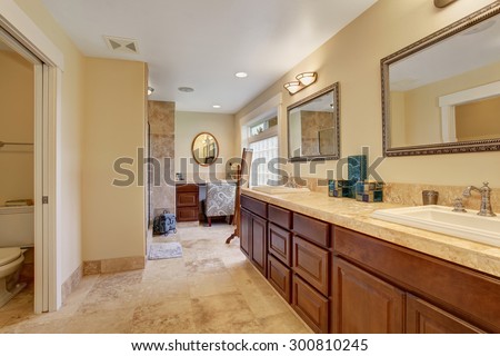 Luxury master bedroom with long counter, and vanity.