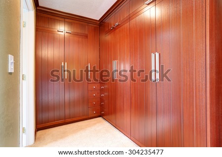 Luxury closet of master bedroom with lots of storage space.
