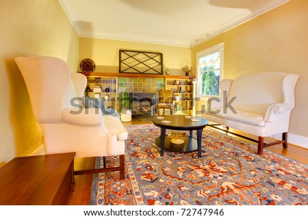 Luxury gold living room with two white sofas