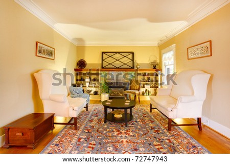 Luxury gold living room with two white sofas