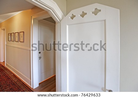 Hallway with old white door. Luxury old home in Tacoma, WA.