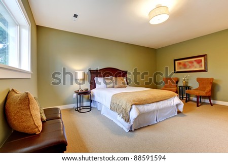 Large new green bedroom well furnished.
