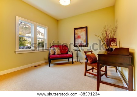 Home office staged with golden and beige.