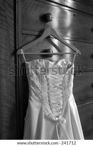 A wedding dress on a hanger