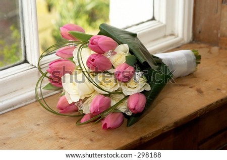 stock photo wedding bouquet of white roses and pink tulips