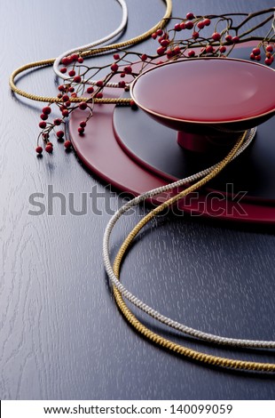 sake cup on lacquer plate