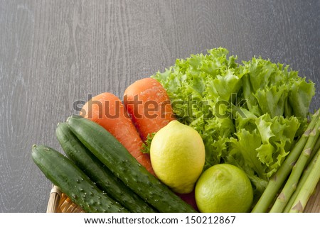 fresh various vegetables, cucumber, carrot, lettuce, asparagus and lemon