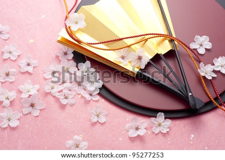 Cherry blossoms and a lacquer-ware board