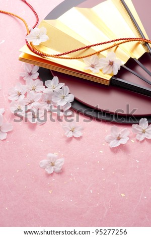 Cherry blossoms and a lacquer-ware board