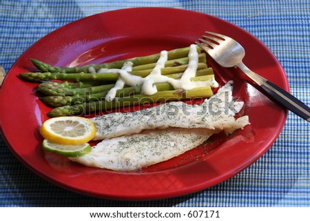 cooked fish and asparagus