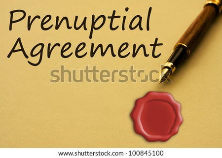 A fountain pen with yellow paper with a wax seal and words prenuptial agreement and copy-space, Getting a prenuptial agreement
