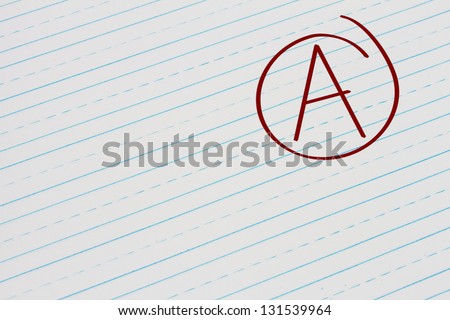 Blue Lined Paper with the grade A in red circled, Getting the grade