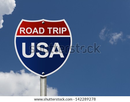 An American road interstate sign with words Road Trip USA with sky, Road Trip USA