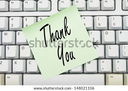Computer keyboard keys with sticky note with words Thank You, Thank You for you online purchase