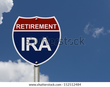 An American road interstate sign with words Retirement and IRA with sky, Your IRA Retirement Fund